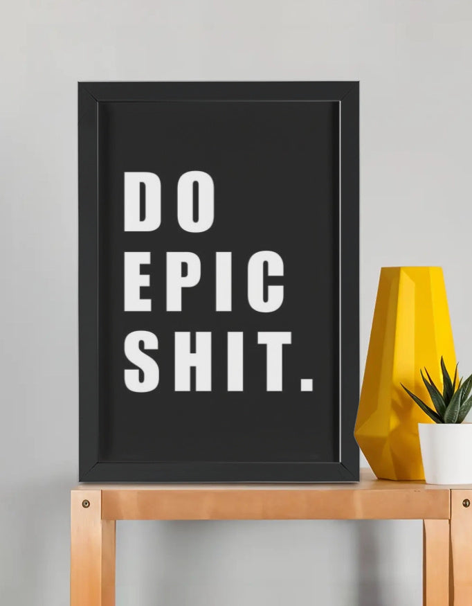 Do Epic Shit framed poster — bold white block typography on matte black background in premium black frame