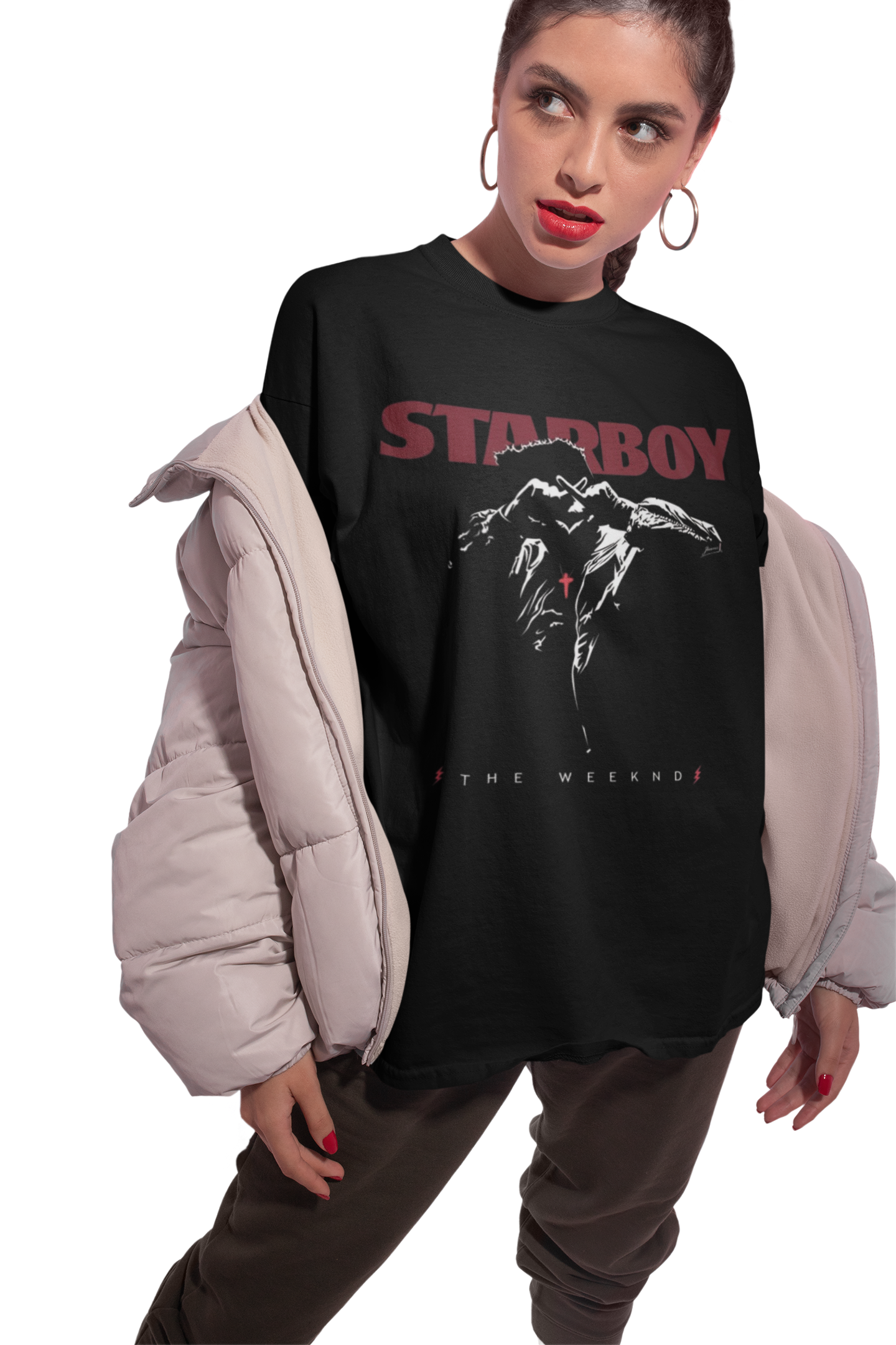 “Woman wearing black oversized The Weeknd Starboy T-shirt – unisex concert merch 2025”