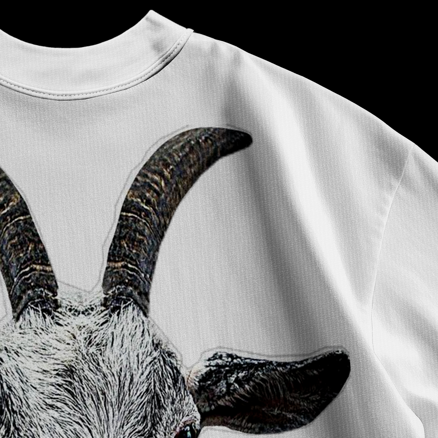 Close-up of photorealistic goat face and horn detail print on amhype white heavyweight oversized tee back