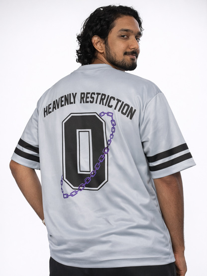 Person wearing a white sports jersey with 'Heavenly Restriction' text and number 0 on a plain background