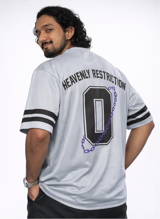 Person wearing a white sports jersey with 'Heavenly Restriction' text and number 0 on a plain background