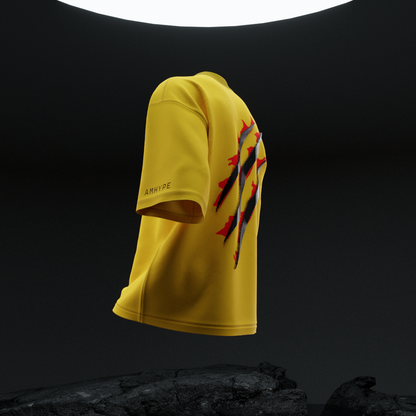 Side angle of amhype Wolverine X-Men oversized tee — X-Men red circle logo on sleeve and AMHYPE branding on yellow 260 GSM terry tee
