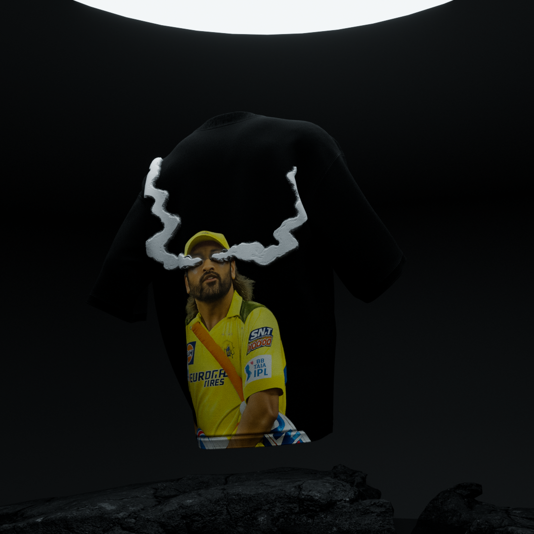 Close-up of amhype MS Dhoni Crown 7 oversized tee — flame crown above number 7 white print on black front, 260 GSM terry cotton