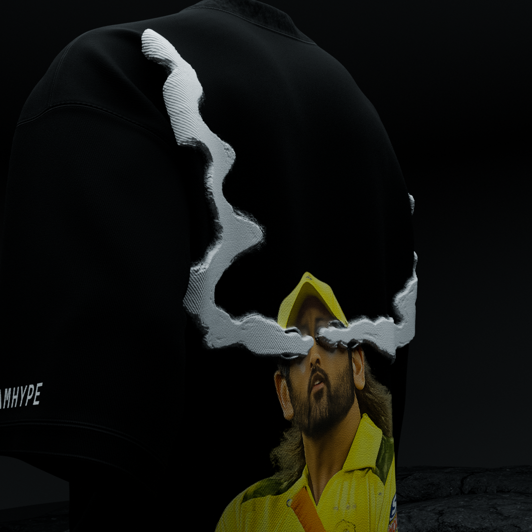 Close-up back detail of amhype MS Dhoni Crown 7 tee — 3D white cloud smoke halo framing Dhoni CSK portrait on black 260 GSM drop shoulder tee