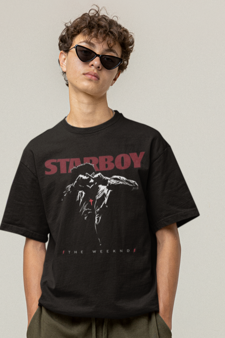 “Man modeling oversized The Weeknd Starboy T-shirt in black – USA limited concert edition”