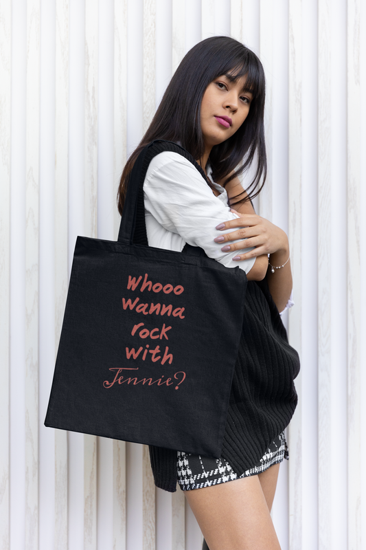 Woman carrying Jennie BLACKPINK black tote bag on shoulder — Rock With Jennie red typography fan art by amhype