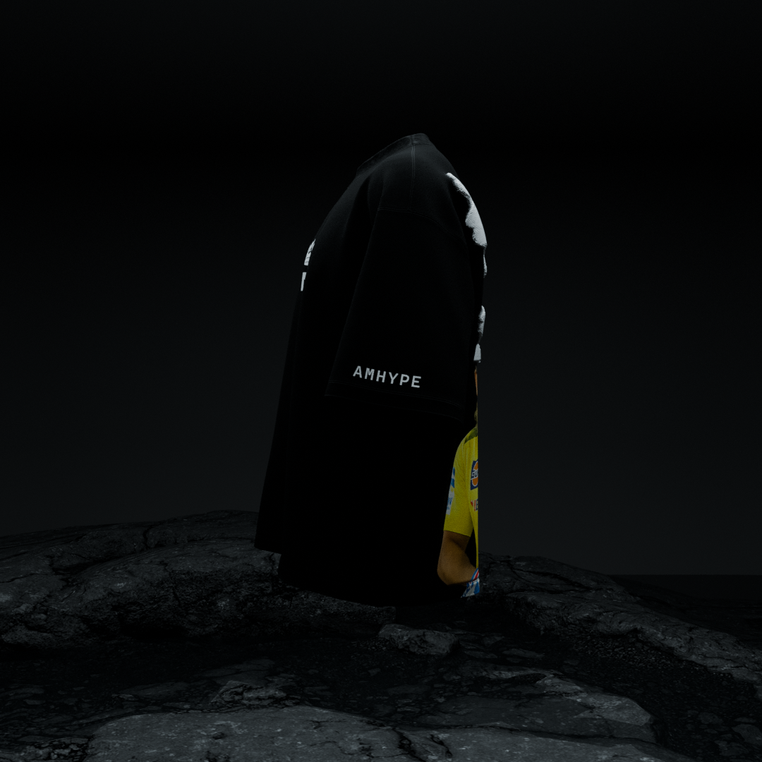 Side angle of amhype MS Dhoni Crown 7 oversized tee — AMHYPE sleeve branding and CSK Dhoni back print on black 260 GSM drop shoulder tee