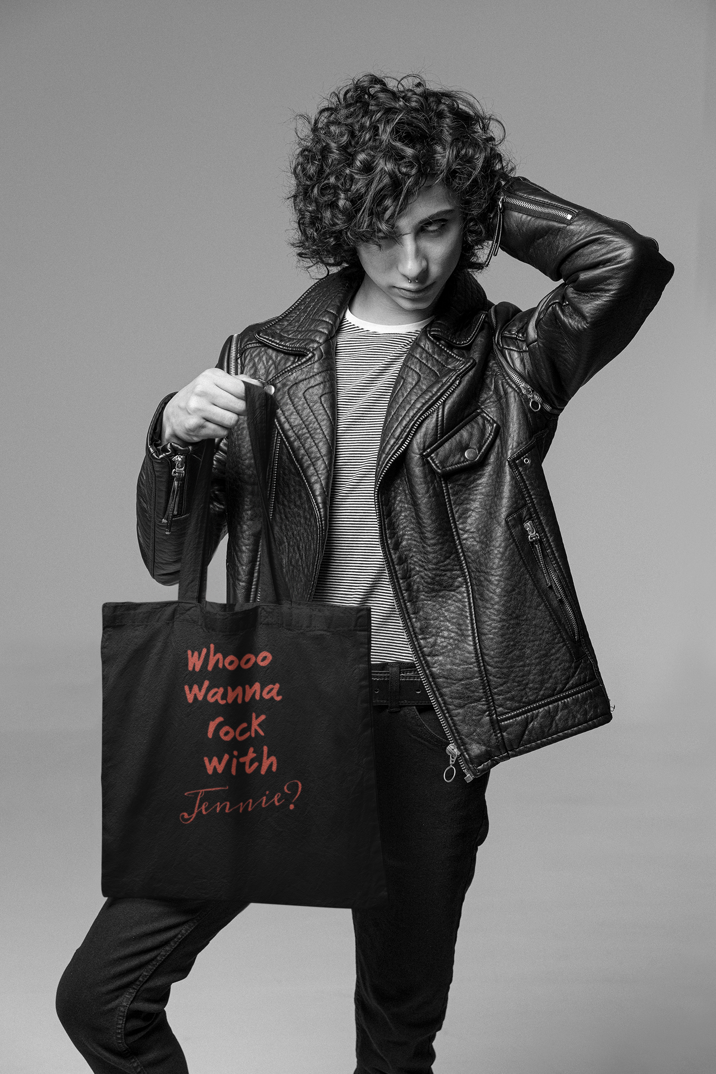 Stylish man posing with Jennie BLACKPINK black tote bag in studio — K-pop fan art unisex carry by amhype